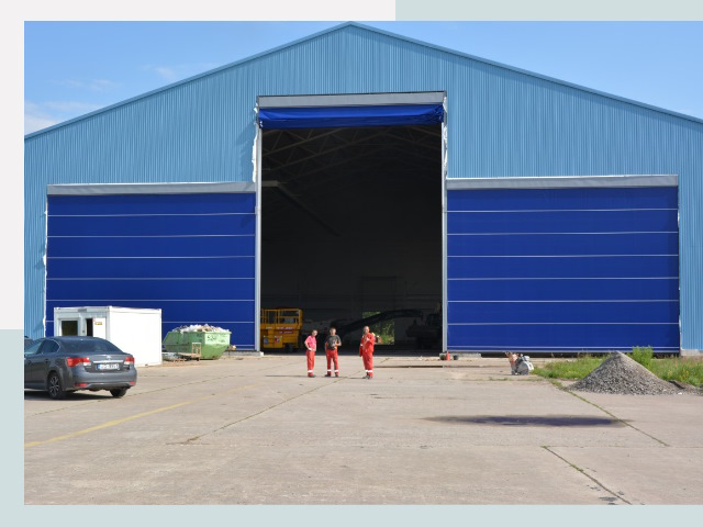 Ангарные ворота в Юрга от СтальСтрой-Юрг по цене 642 руб.